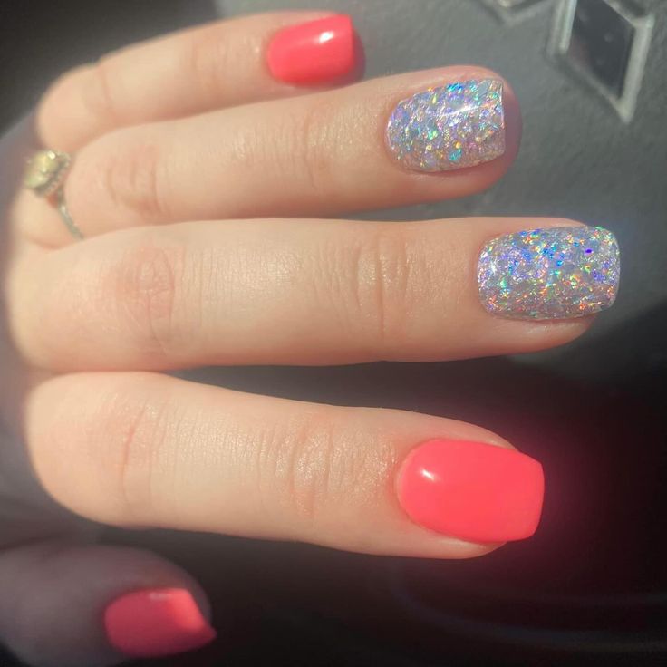 Chic Coral Nail Design with Glitter Accents for a Playful Touch