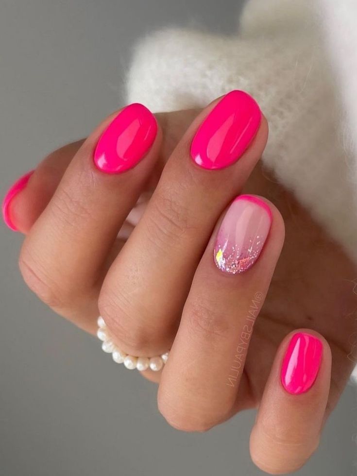 Vibrant Pink Nail Design with Glossy Finishes and Ombre Accent Nail.