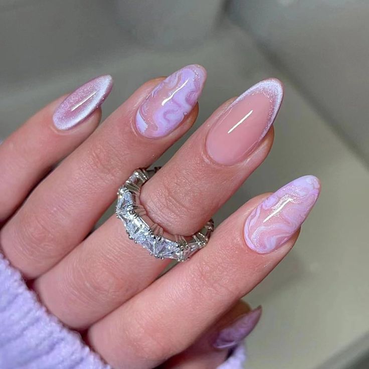 Sophisticated Elegant Marble Nail Design with Lavender Swirls and Glossy Almond Shape.