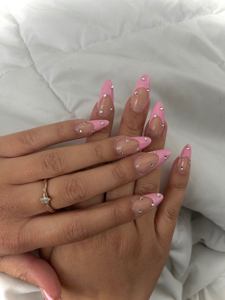 Elegant Pink and Nude Stiletto Nail Design with Sparkling Rhinestones and Playful Tips