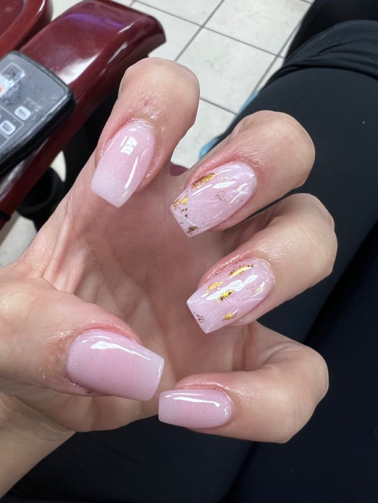 Elegant Soft Pink Gradient Nail Design with Glossy Finish and Gold Foil Accents