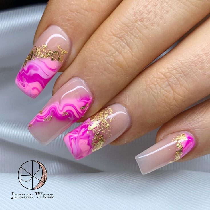 Chic Pink and White Marble Nail Design with Elegant Gold Accents