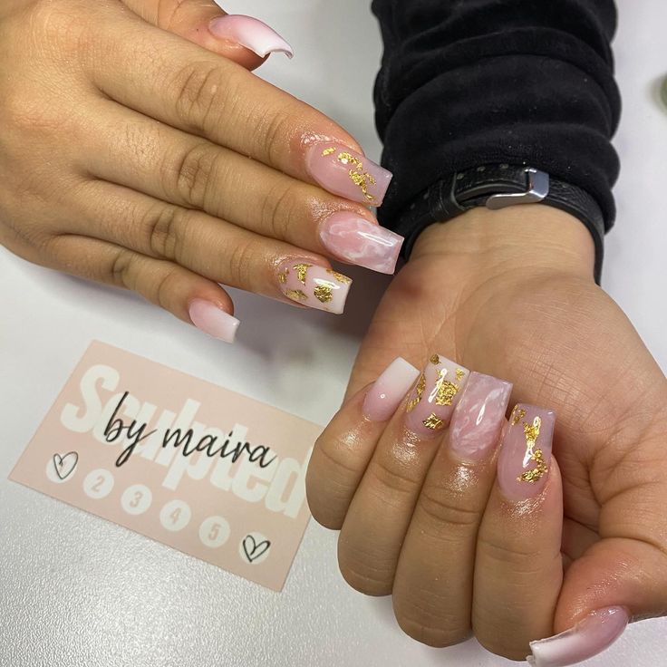 Chic Pink and White Swirl Nail Design with Gold Foil Accents for a Sophisticated Look.