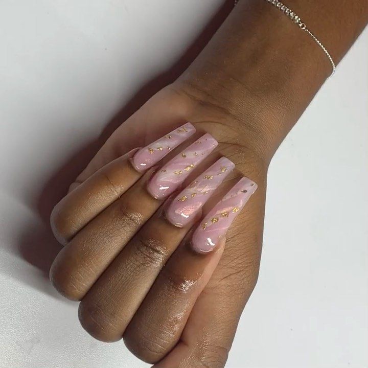 Chic Almond-Shaped Nails with Soft Pink Gloss and Elegant Gold Accents