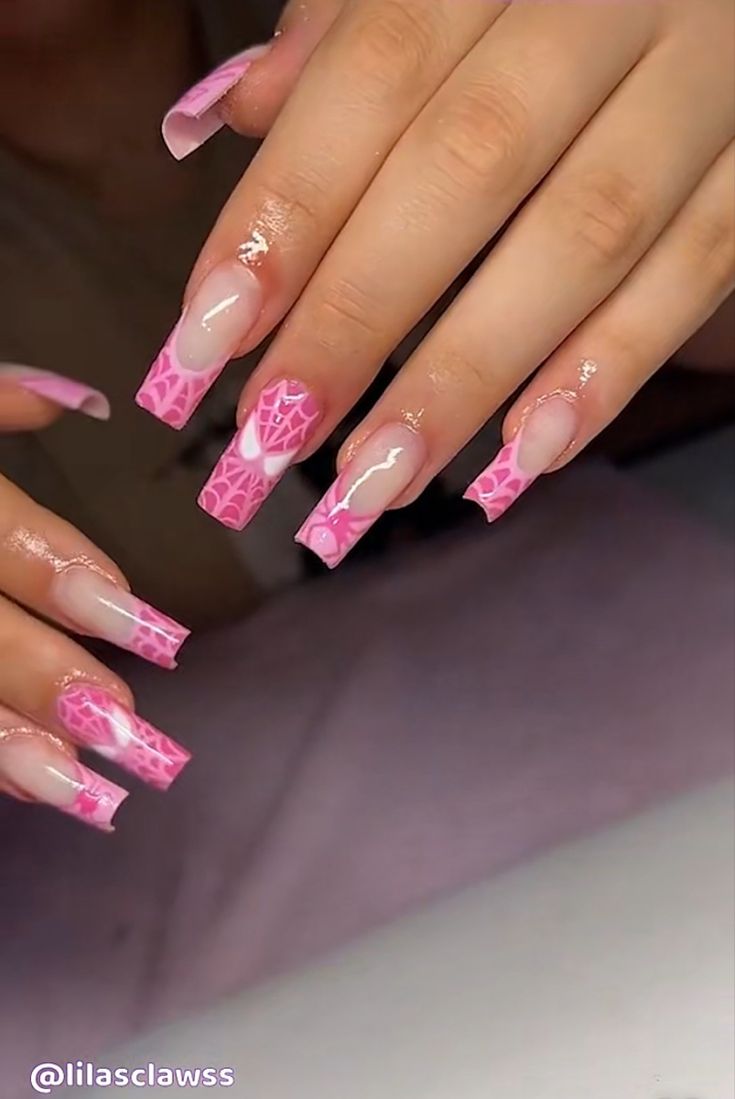 Vibrant Pink Nail Design with Chic Geometric Patterns and Glossy Finish.