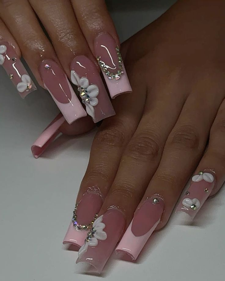 Chic Elegant Nail Design with Pink Gradient, Floral Accents, and Rhinestones