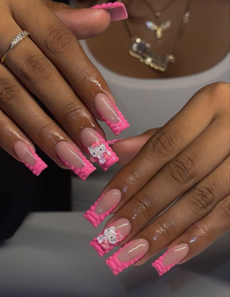 Trendy Vibrant Pink Nail Design: A Playful Fusion of Boldness and Elegance.