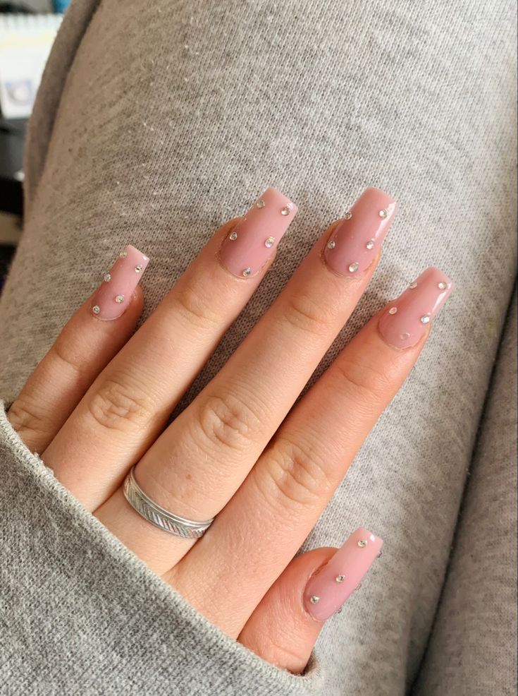 Sophisticated Glossy Nude Nails with Rhinestones and Long Square Shape