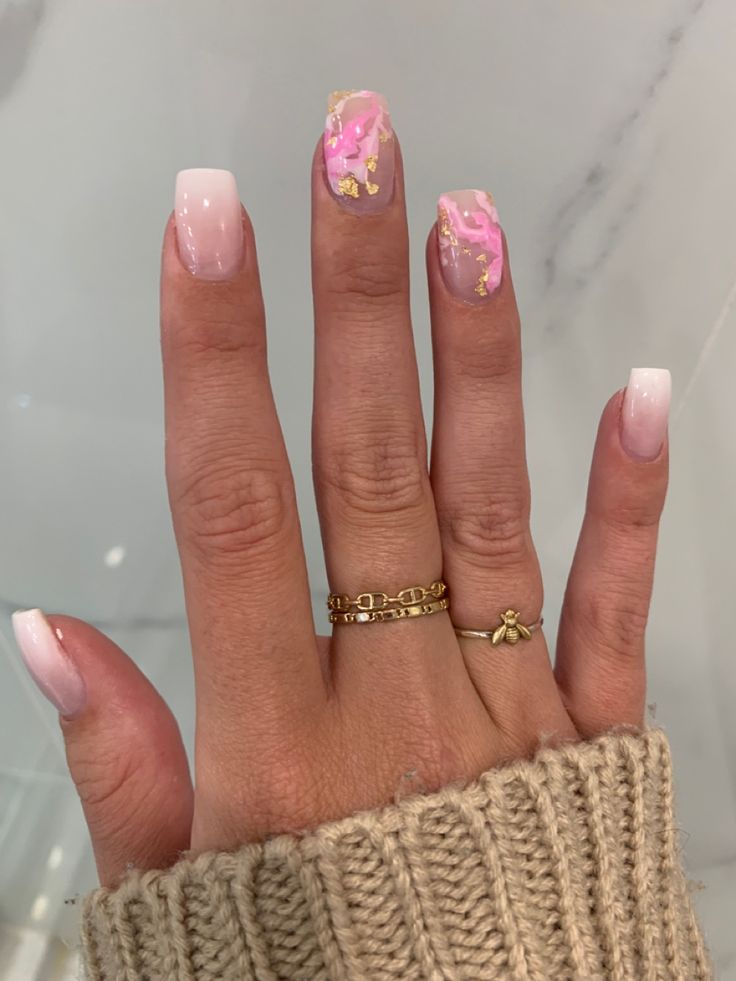 Chic Nail Design: Soft Pinks with French Tips and Glamorous Accents