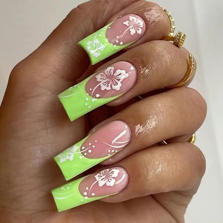 Playful Sophistication: Elegant Floral Motif Nail Design in Pastel Pink and Bright Green.