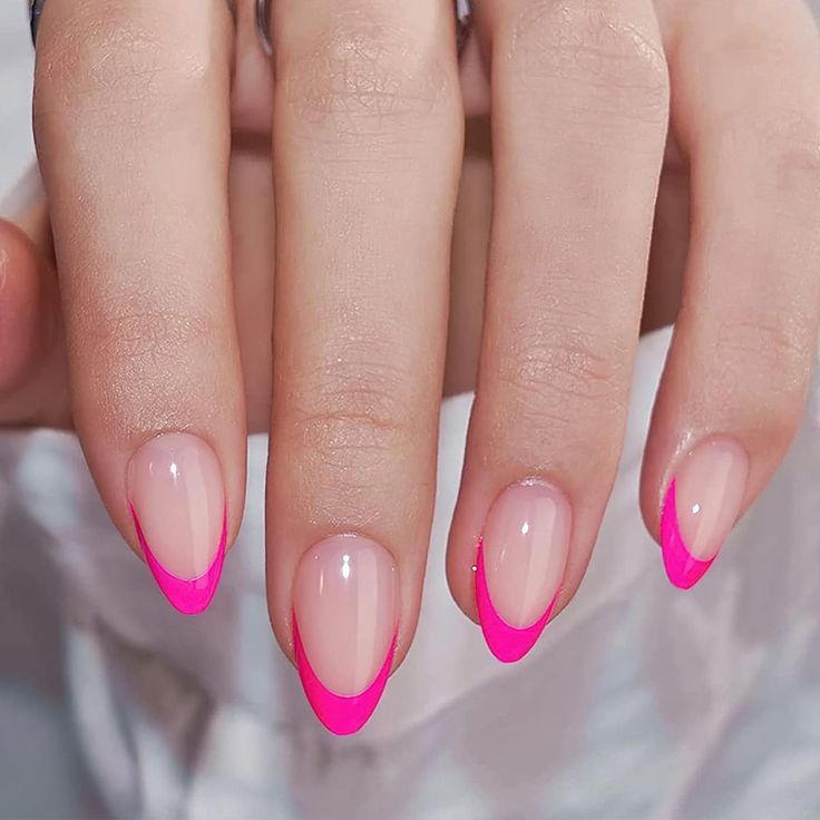 Elegant Hot Pink French Tips on Soft Nude Base: A Modern Manicure Twist.