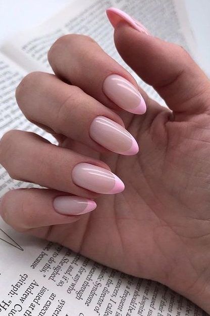 Sophisticated Almond-Shaped Nails with Soft Pink French Tips on Sheer Nude Base