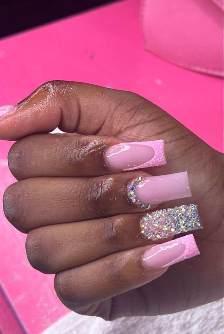 Elegant Pink and Sparkling Rhinestone Nail Design.