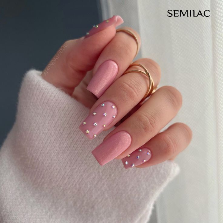 Chic Soft Pink Nail Design with Matte-Gloss Finish and Rhinestone Accents.