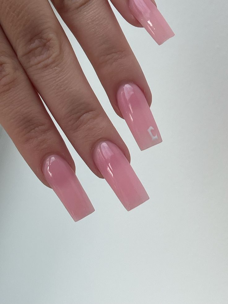 Chic Pink Gradient Long Nails with Glossy Finish and Playful Accent.