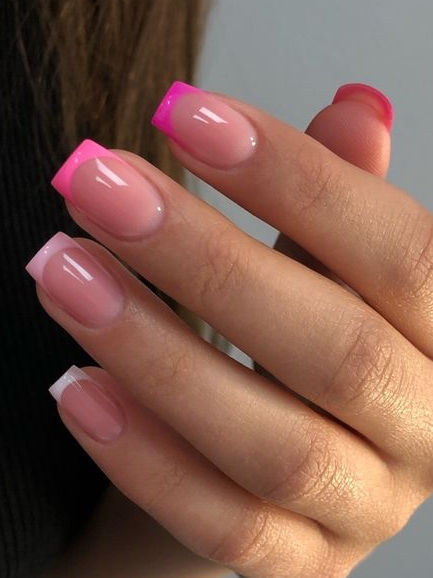 Trendy Gradient Pink-Tipped Nails: A Modern Twist on the French Manicure.