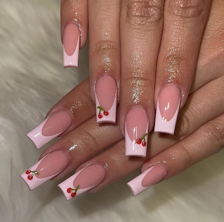 Delightful Cherry Motif Nail Design: Soft Pink Elegance Meets Playful Glossy Tips.