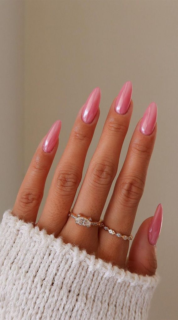 Chic Glossy Pink Almond Nails: A Sophisticated Touch for Any Occasion.