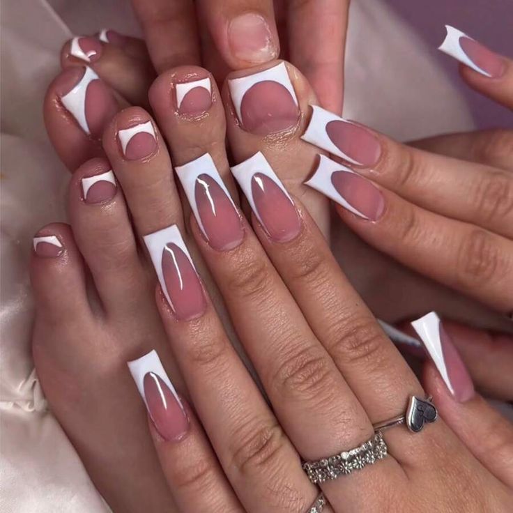 Chic Nail Design: Elegant White Tips and Geometric Cutouts for a Polished Look