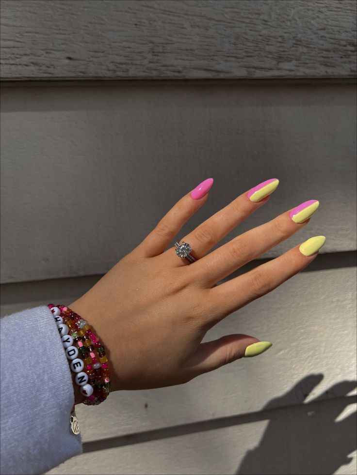 Eye-Catching Colorful Nail Design with Pastel Pink and Yellow Tones