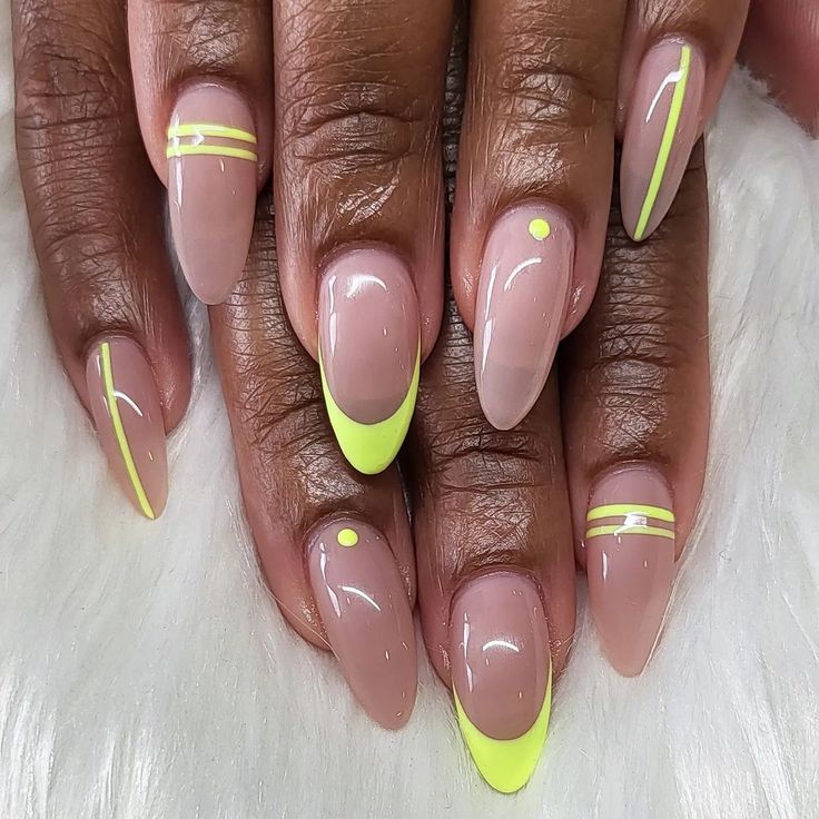 Chic Almond-Shaped Nails: Elegant Nude Base with Bold Neon Yellow Accents