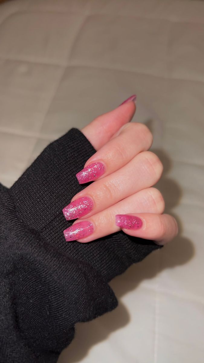 Stunning Glittery Pink Gradient Nail Design for a Playful Aesthetic.