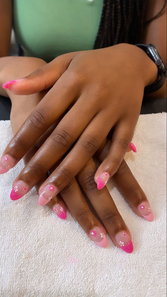 Chic Gradient Pink Nail Design with Floral Accents for Any Occasion