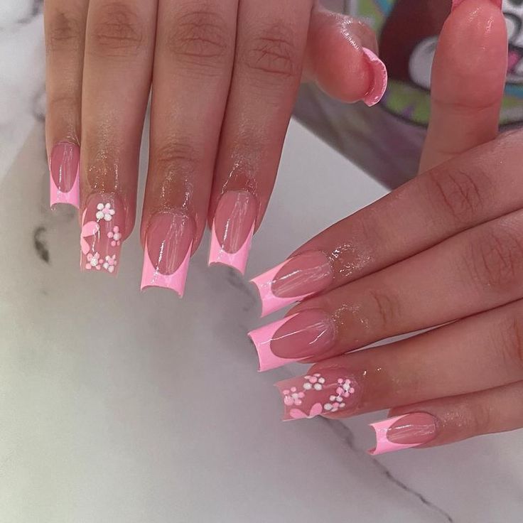 Elegant Floral Pink Square Nail Design with Glossy Accents and Heart Details.