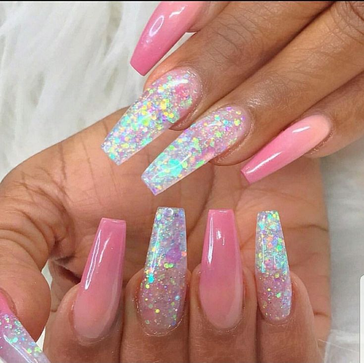 Elegant Pastel Pink Nails with Holographic Glitter Accents for a Modern Aesthetic.