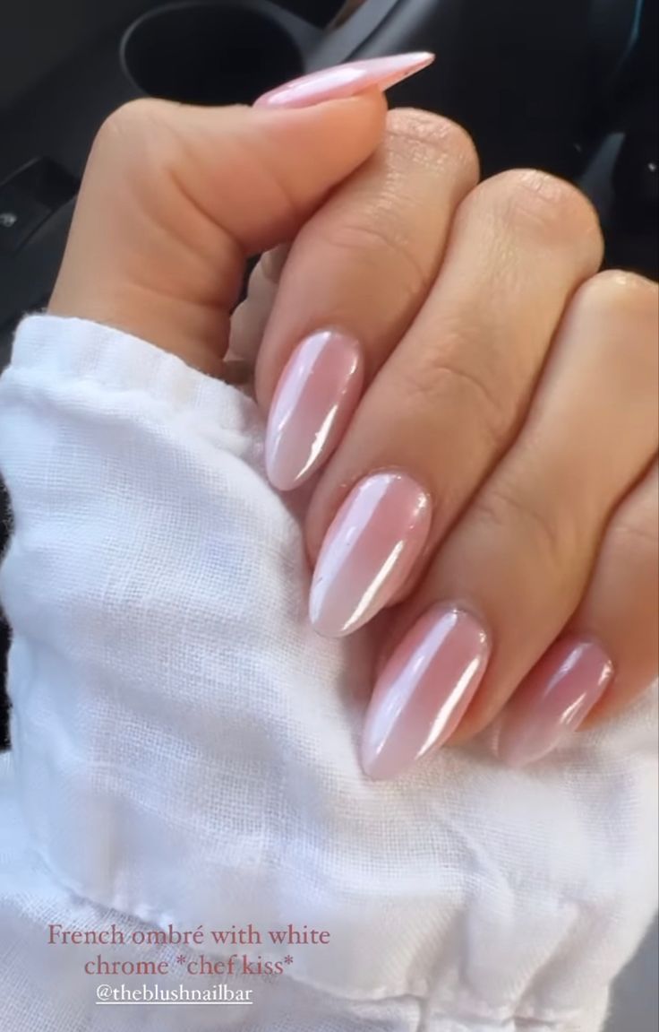 Chic Elegant French Ombre Nails with Glossy White Tips and Subtle Chrome Finish.