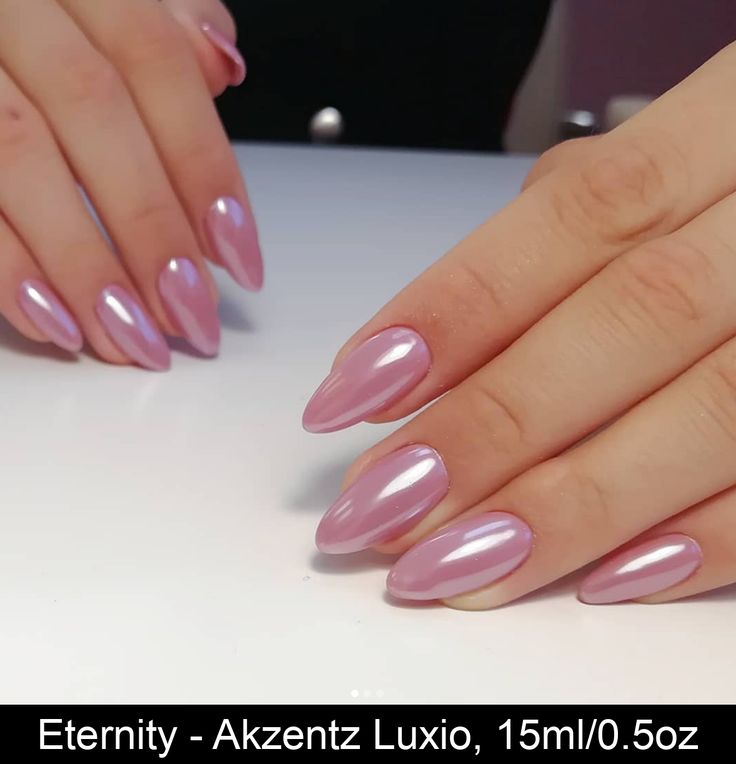 Chic Almond-Shaped Nails in Soft Pink: Timeless Elegance with a Glossy Finish.