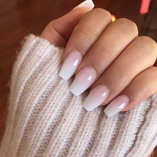 Elegant Ombre Nail Design: Chic Gradient from Soft White to Transparent Tips for Any Occasion.