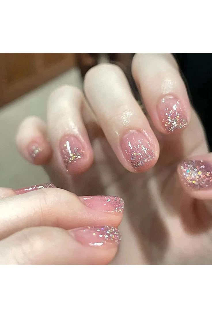 Enchanting Pink Glitter Nails: A Perfect Blend of Simplicity and Sophistication.