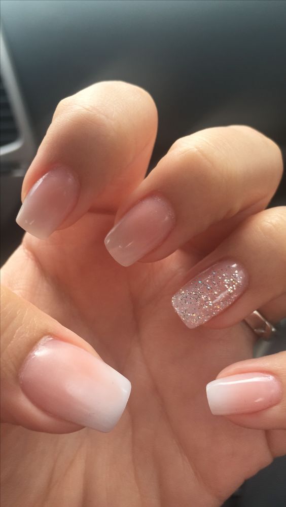 Elegant Pink and Clear Ombre Nail Design with Glitter Accent for Any Occasion