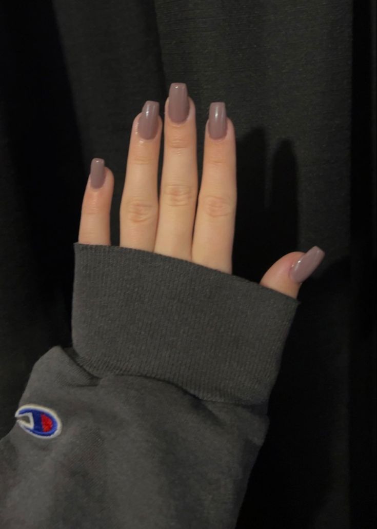 Chic Casual Vibe: Elegant Glossy Mauve Nail Design Paired with Cozy Sweatshirt