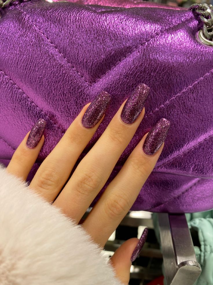 Elegant Sparkling Purple Acrylic Nails: A Dazzling Fashion Statement.