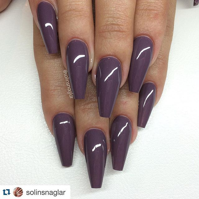 Sophisticated Almond-Shaped Nails in Glossy Muted Purple.