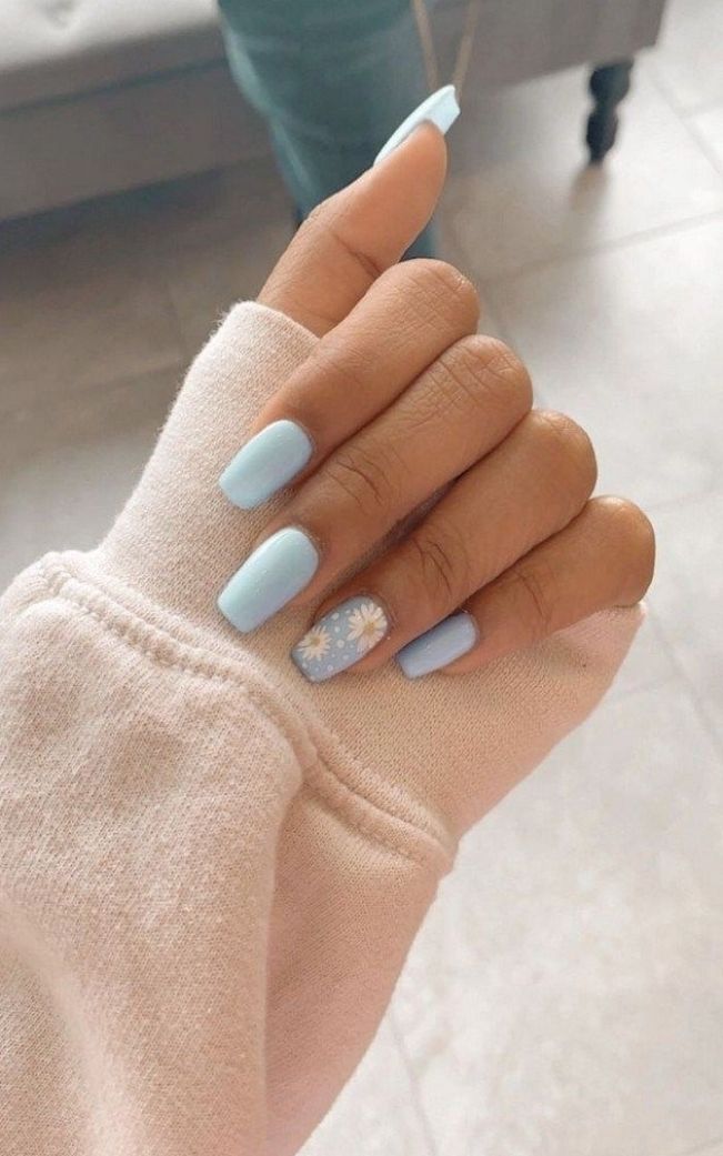 Charming Pastel Blue Nails with Whimsical Floral Design and Modern Square Shape.