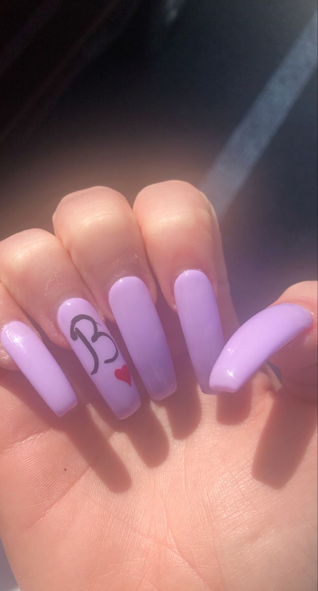 Trendy Lavender Nail Art: Glossy Long Nails with Playful Personalization