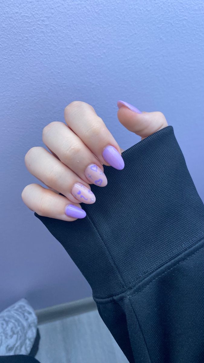 Elegant Whimsical Lavender Nail Art with Subtle Designs