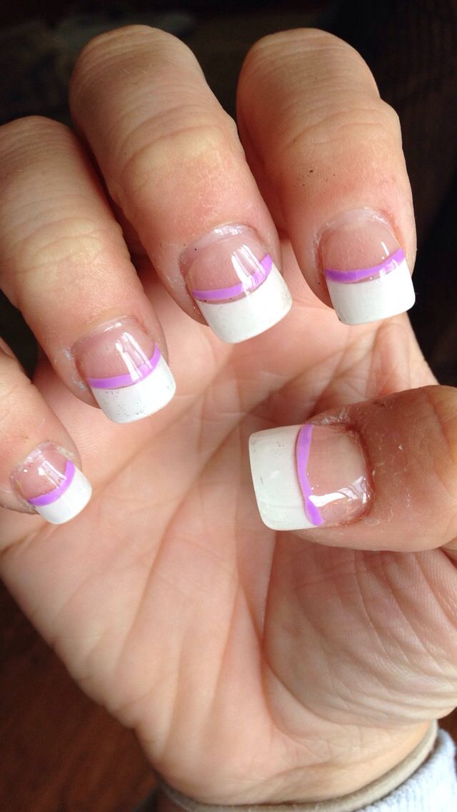 Modern French Tip Nail Design with Lavender Accents.