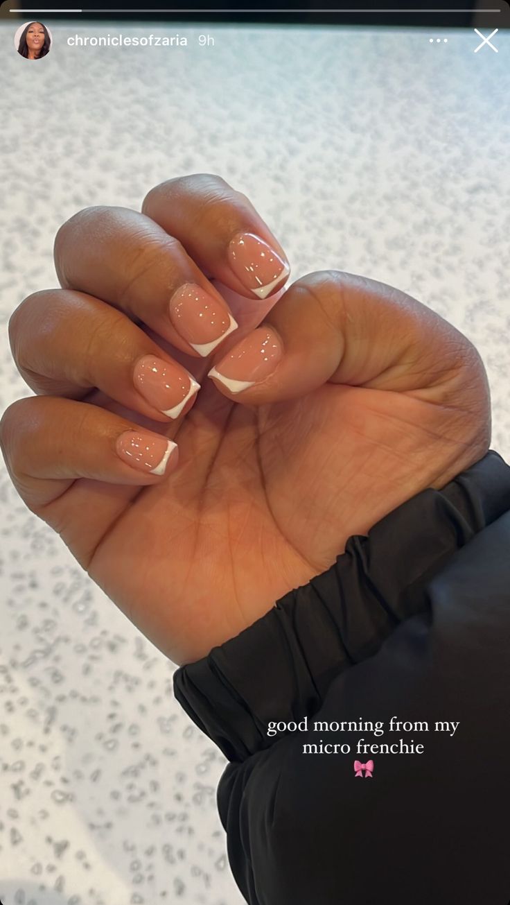 Chic Micro French Tip Nail Design with Soft Nude Base and Dot Accents.