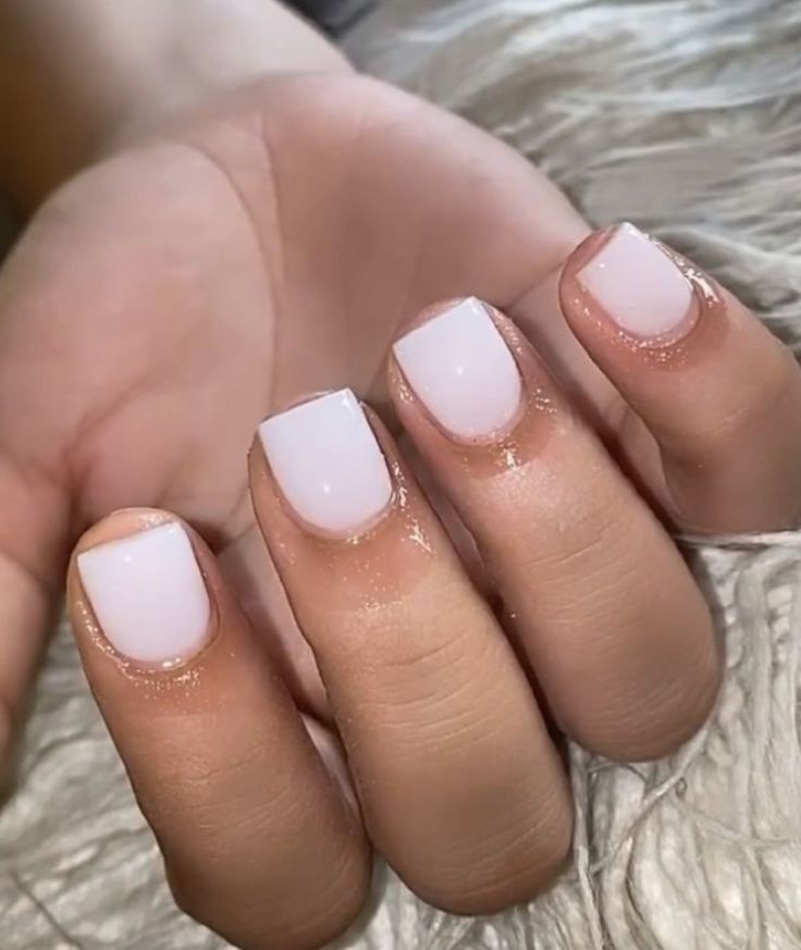 Elegant Minimalist Nude Nails: Timeless Versatility and Polished Aesthetic.