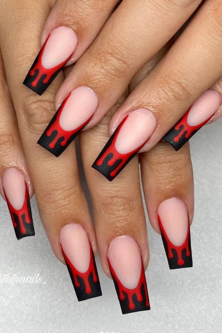 Dramatic Red and Black Flame Nail Design with Matte and Glossy Finishes.