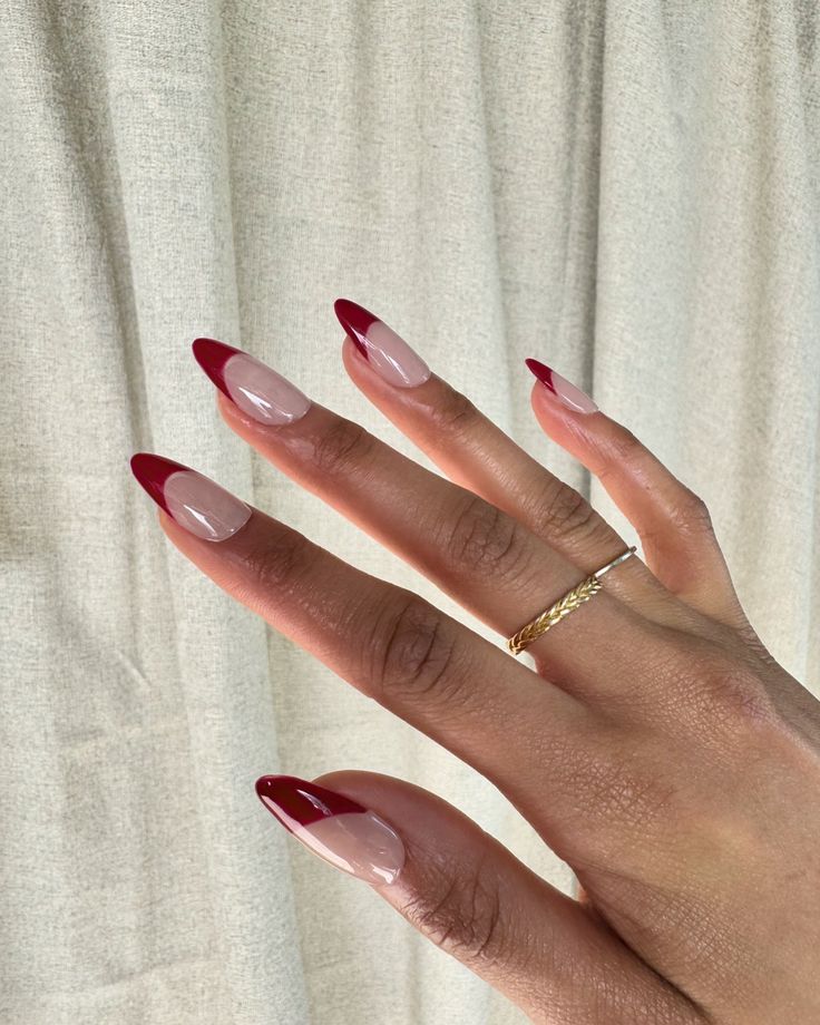 Chic French Tip Nail Design: Bold Nude and Red Contrast for a Modern Twist.