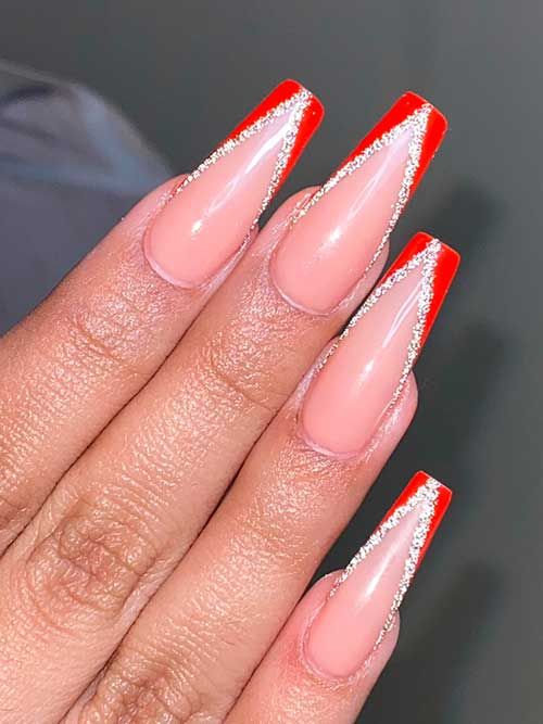 Elegant Nude Nails with Bold Red Tips and Silver Glitter Accents