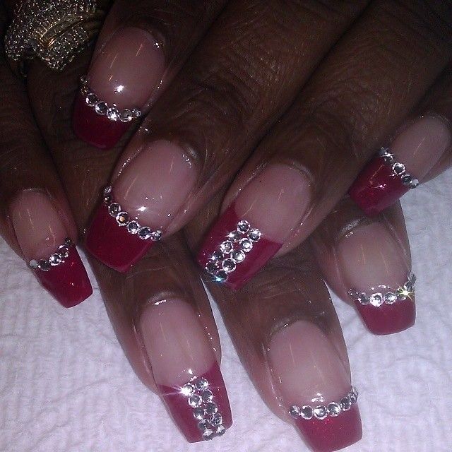 Chic Deep Red and Nude Nail Design with Glamorous Rhinestones