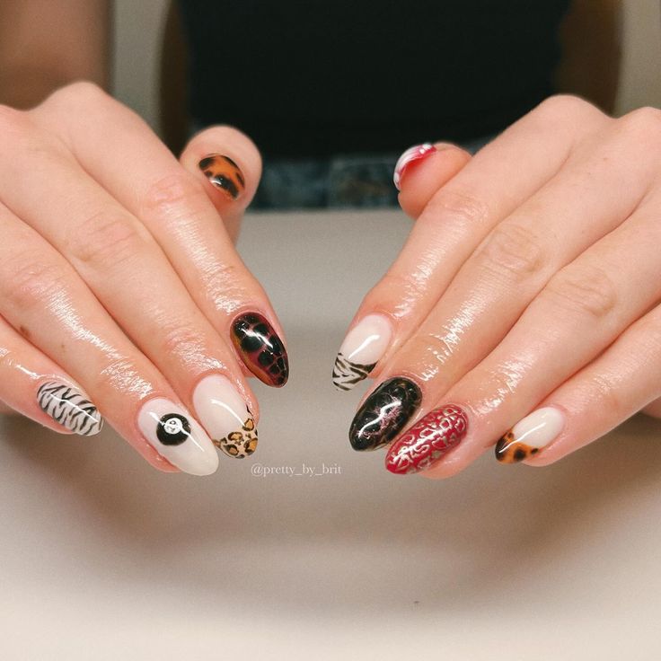 Eclectic Colorful Nail Designs Blending Animal Prints and Bold Hues