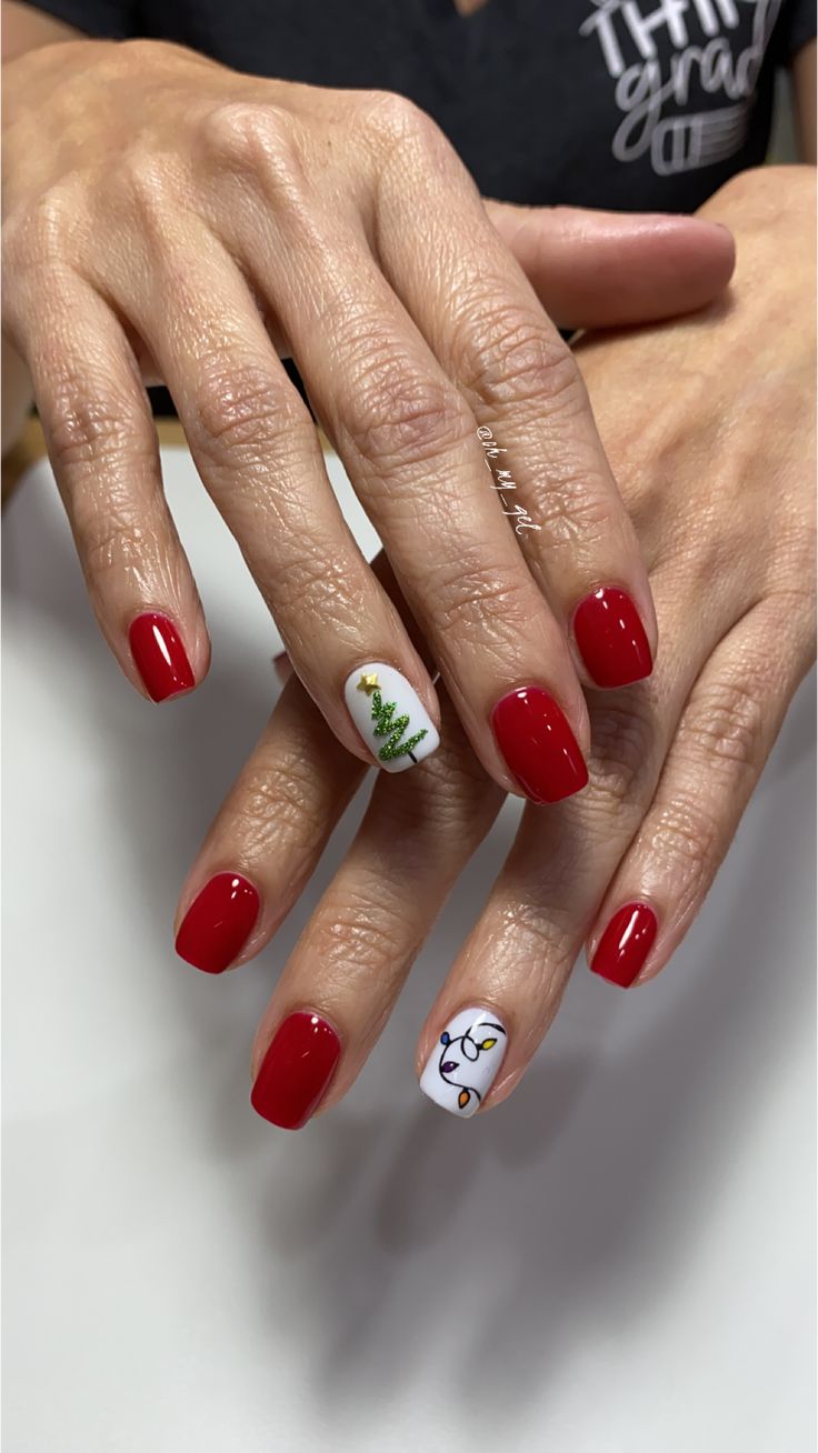 Festive Glossy Red Nails with Christmas Tree and Ornament Accents