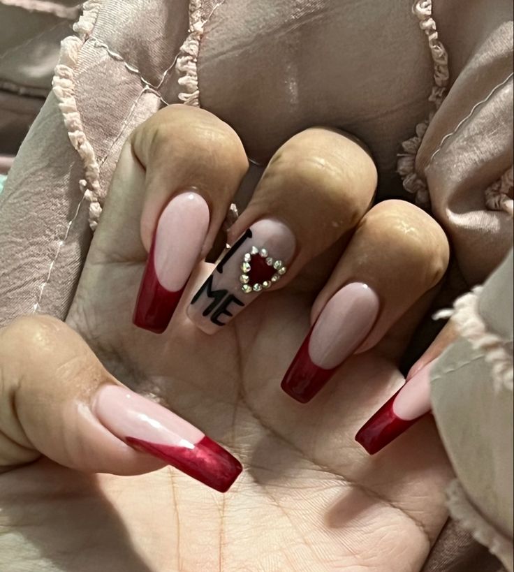 Chic Nail Design: Elegant Long Nails with Soft Pink and Bold Red Accents